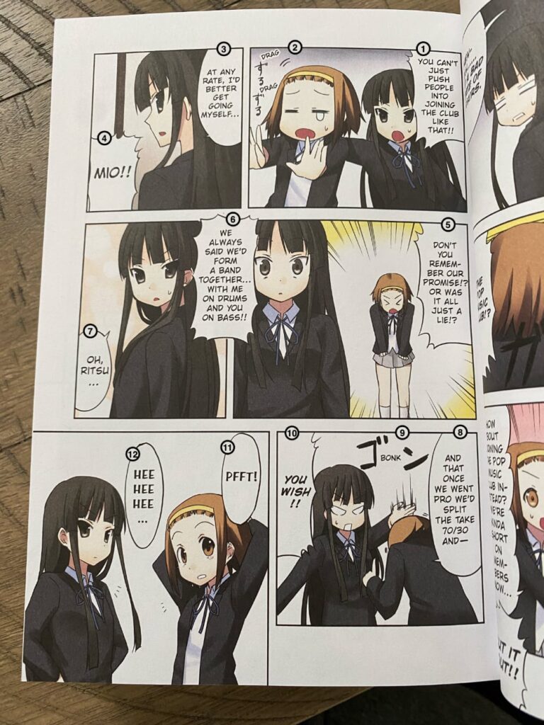 Another picture of a page from K-On! The Complete Omnibus Demonstrating the way the book has to be read.